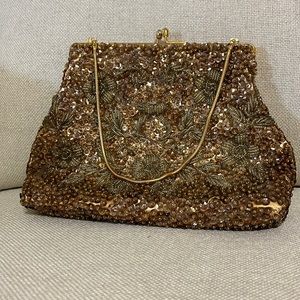 Gold vintage purse. Beads and sequined. Gold toned chain and gold toned clasps.